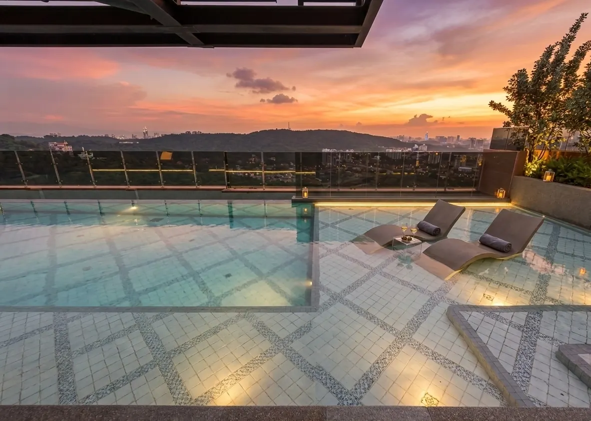 Rooftop infinity pool at sunset